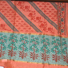 Semi Silk Cotton Orange saree with floral print