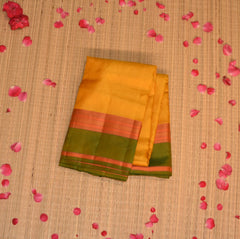 pure kanchi silk mustard yellow saree with green gap boarder