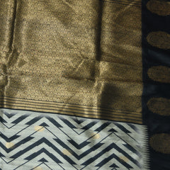 4389 cream with black semi tussur saree with jari butta